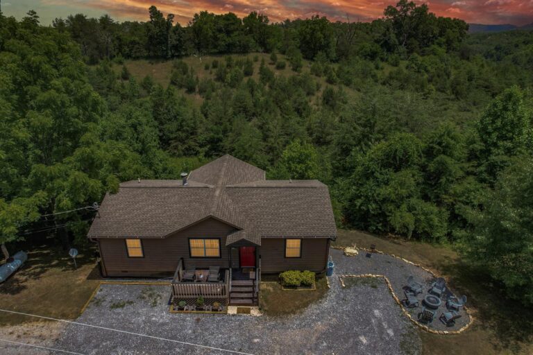 Arial view of Rocky Top Escape.  Parking area, fire pit, front porch. Nice and quiet!