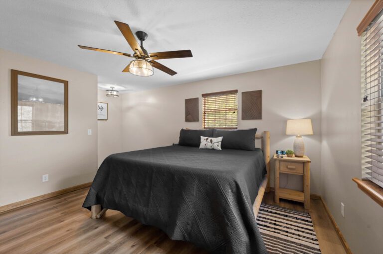 King Master Suite #1 with desk, chair, box fan, dresser, 36" dog crate, smart TV +