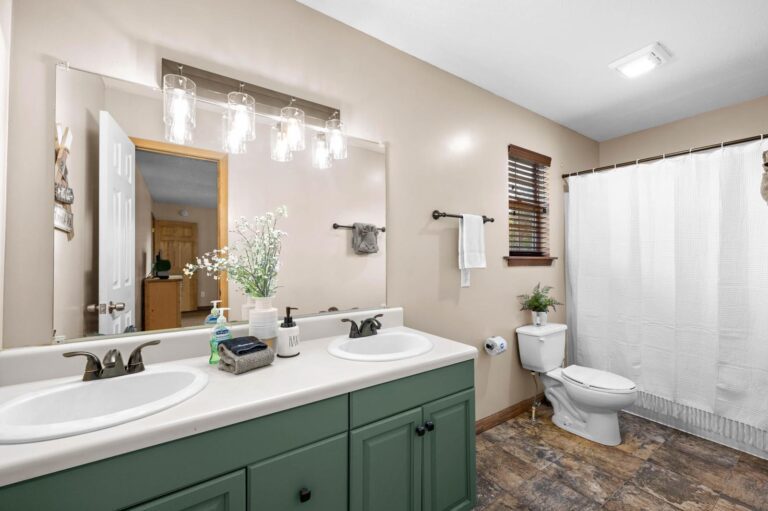 Master bath #1. Spacious, with double vanity, tub/shower combo