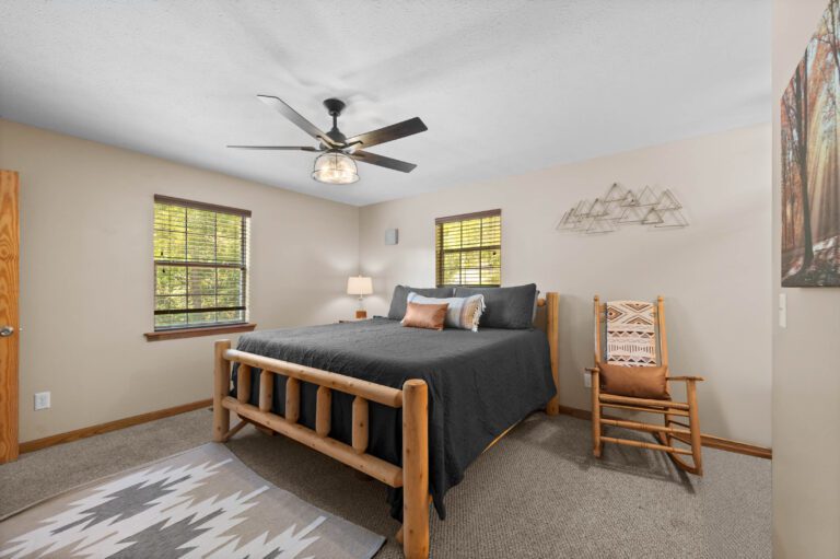 King Master Suite #2 with 36" dog crate, arcade, box fan, dresser, rocking chair, smart TV +