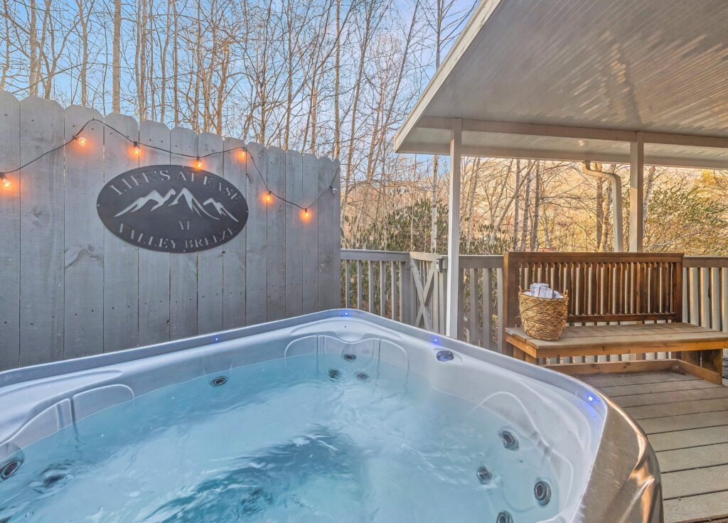 Luxurious private hot tub with steps and cover lifter