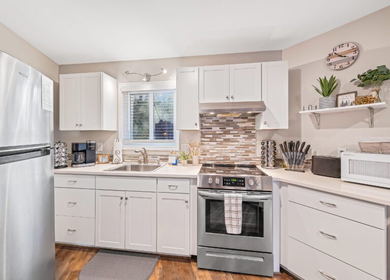 Fully stocked, updated kitchen with great appliances and plenty of room to gather for a meal