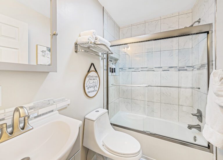 Updated bathroom with shower and tub