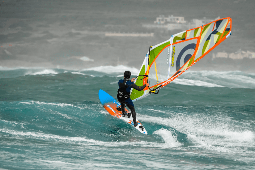 man doing windsurfing
